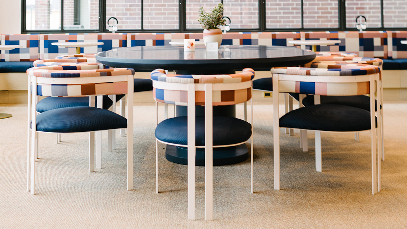 A table and chairs in the quiet room at The Wing. 