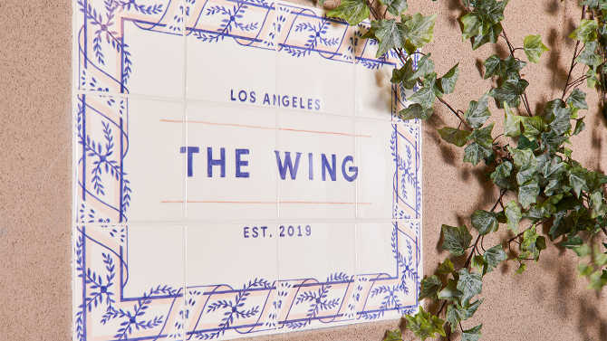 The tile plaque at the entrance of the Wing. 