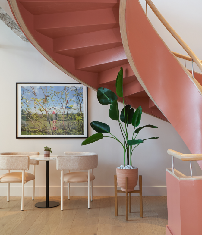 A photo of a spiral staircase at The Wing Boston